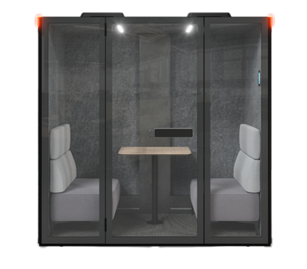 Black Cove Meeting Pod with facing seating, a table and glazed doors.