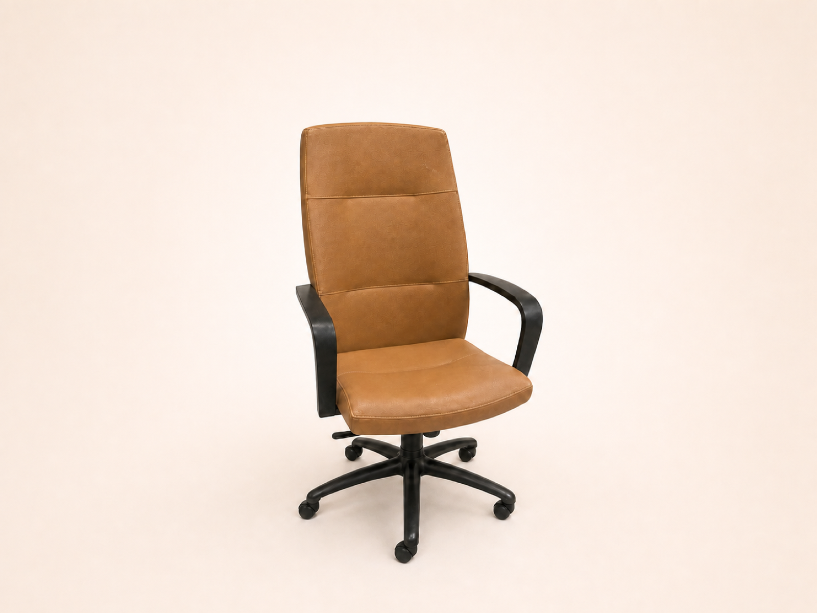 Tan Gunlocke leather chair with black arms and a five-star base.